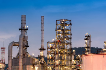 .Oil Refinery Factory, Petrochemical Plant, Petroleum, Chemical Industry, Oil Tanks At Twilight Sky Background