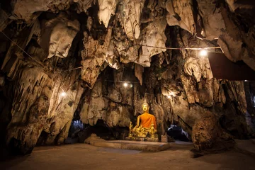 Foto op Plexiglas Boeddha The old ancient buddha statue in cave at Wat Tham Khao Pun, Kanchanaburi Province, Thailand.
