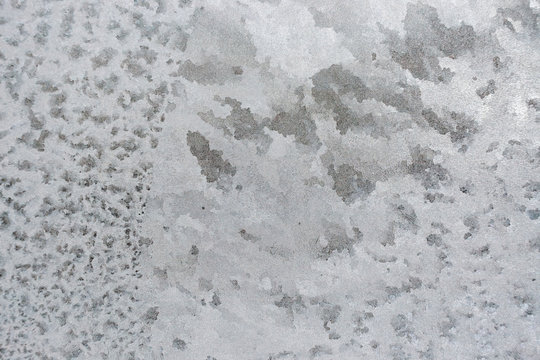 Close-up of a structural pattern of ice on the window glass.
