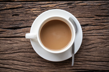 cup of coffee on wooden table