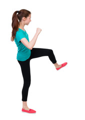 skinny woman funny fights waving his arms and legs. Rear view people collection.  backside view of person.  Isolated over white background. Sportswoman doing an intense workout.