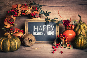 Blackboard with chakboard text "Happy Thanksgiving!" and decorac
