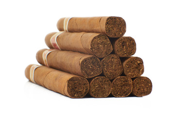 many cigars on the table with shirt
