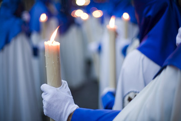 Obraz premium Penitents bearing candles, Holy Week 2008, Seville, Spain