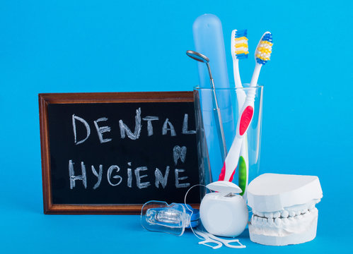 Dental set on a blue background. Dental Care and Oral