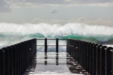 Beach Pier Waves ocean storm swells crashing water power