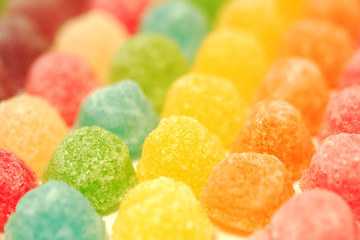 many colorful fruit gelatin in soft focus texture background 