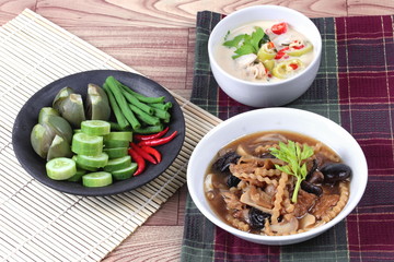 Organic Thai recipe as coconut milk and fermented soy bean sauce call "Toa Jiaw Loan J"  with mixed vegetables  and brown soup mixed vegetable and tofu sheet are in Chinese  vegetable festival  style.