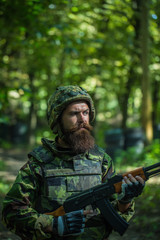 Bearded soldier in the forest