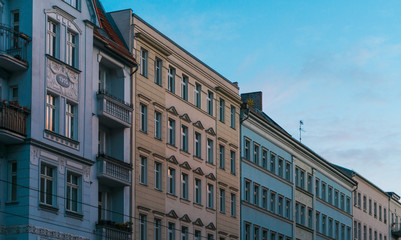 Fototapeta na wymiar Exterior view on rows of close apartment buildings