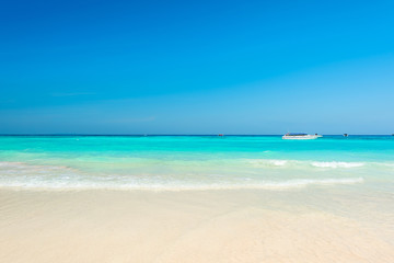 Breathtaking turquoise sea, Exotic beach with gentle wave and clear on beach with blue sky