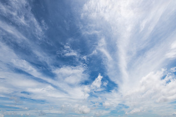 blue sky with white fluffy clouds