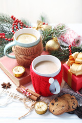 Cup of coffee and tea on a wooden table