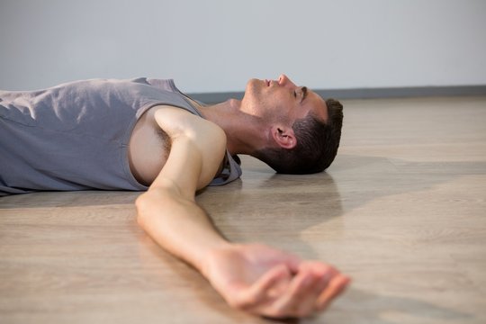 Man In Yoga Corpse Pose