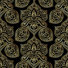 Ethnic seamless pattern in gold and black colors