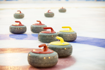 Curling stones on ice
