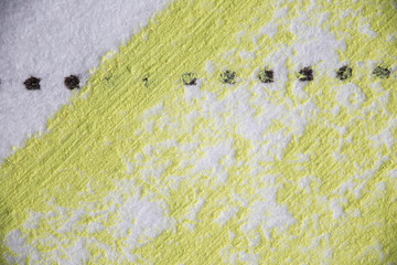 Extreme macro image of pastel pigment on notebook paper, background texture