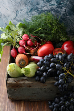 Organic fruits and vegetables in crate