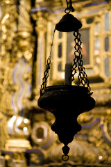 Lamp with a candle, San Luis de los Franceses church, Seville, Spain