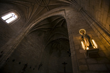Image of the Virgin lit with electric candles, Santos Martires church, Brozas, Caceres, Spain