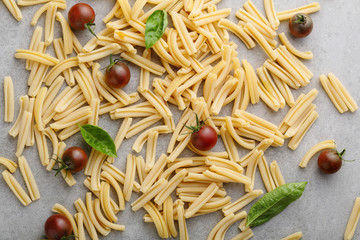 raw pasta and tomatoes