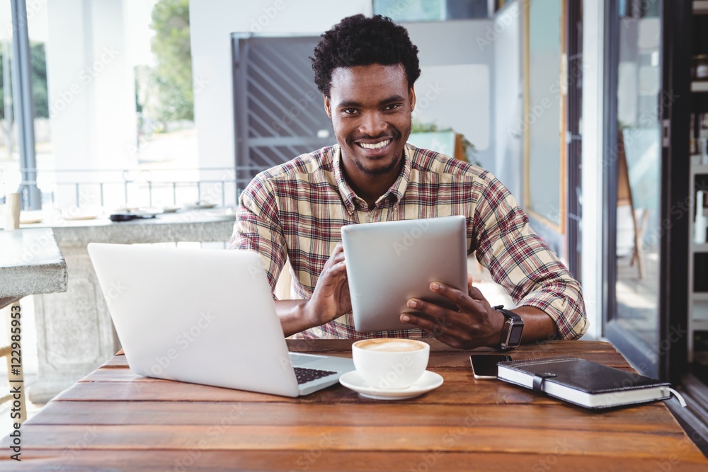 Poster man using digital tablet