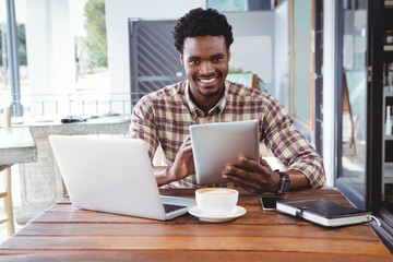 Man using digital tablet