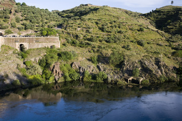 Tagus river close to Alcantara bridge, province of Caceres, autonomous community of Extremadura, southwestern Spain - obrazy, fototapety, plakaty