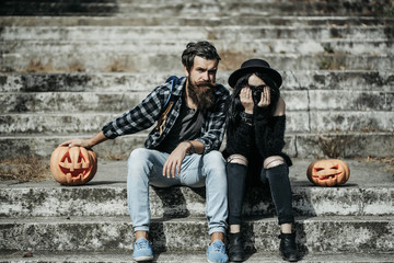 halloween couple with pumpkin