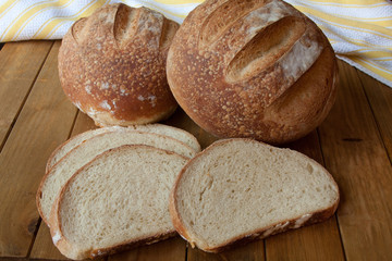 Whole sourdough breads with slices