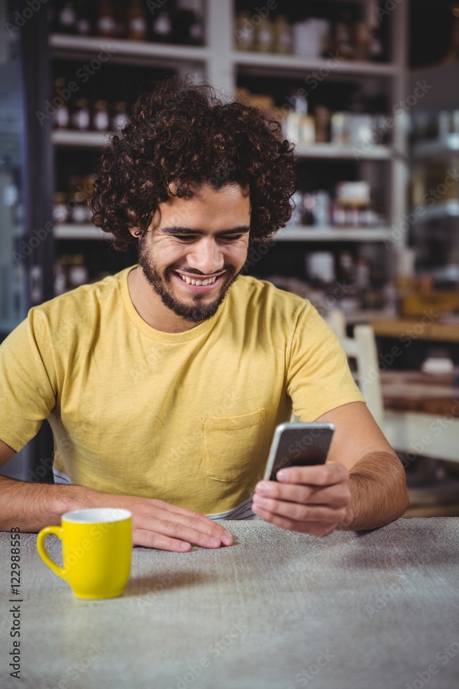 Poster man using mobile phone