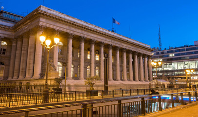 The Bourse of Paris-Brongniart palace at night, France.