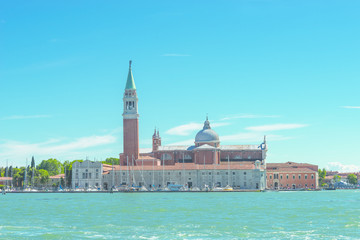 Fototapeta na wymiar Beautiful Church of San Giorgio Maggiore and gondolas, Venice, I