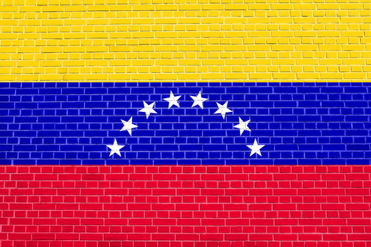 Flag of Venezuela on brick wall texture background