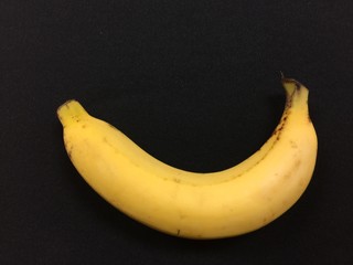 Banana on black background