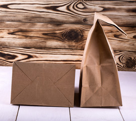 Brown Lunch Bag on white wooden table