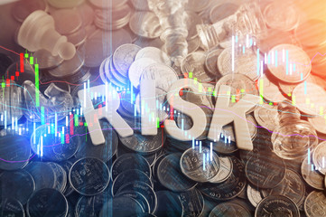 Closeup wood letters of risk word.jpg