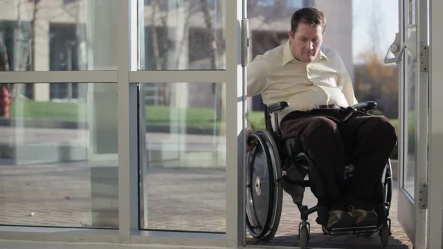 Entering a hospital in a wheelchair