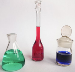 Set of glassware filled by solutions of different chemicals