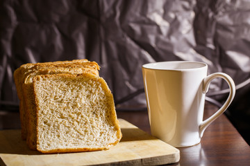 Wheat bread with a glass of coffee.
