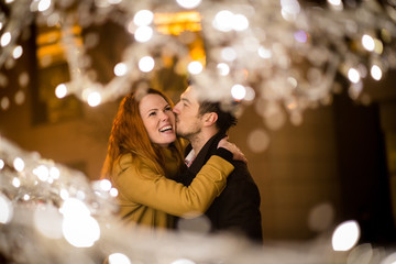 Christmas season romance - couple in street