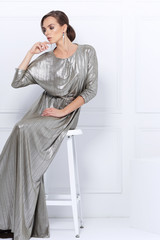 Fashion photo of beautiful lady in elegant evening dress