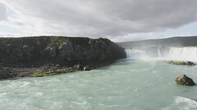 Iceland nature landscape Godafoss waterfall. Famous tourist attraction and landmarks destination in Icelandic nature landscape on the ring road in summer. RED EPIC SLOW MOTION.