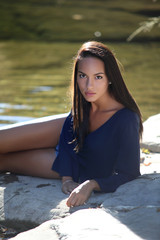 Beautiful girl at riverside
