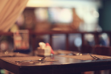 Obraz na płótnie Canvas table setting in restaurant
