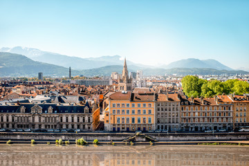 Morning cityscape view on the old town with mountains and river in Grenoble city on the south-east of France - obrazy, fototapety, plakaty