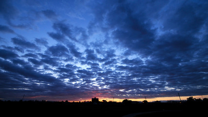 Twilight cloudscape sun set scene