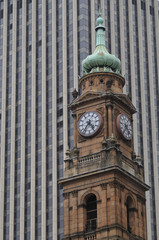Fototapeta na wymiar Old Victorian clock tower in Sydney Central Business District