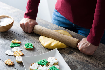 Woman crushing the sourdough while preparing Christmas Cookies