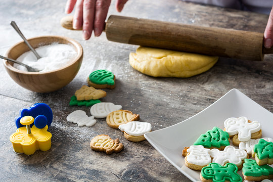 Woman crushing the sourdough while preparing Christmas Cookies